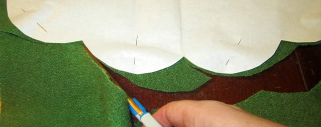 cutting scallop edge into felt penny rug recycled wool